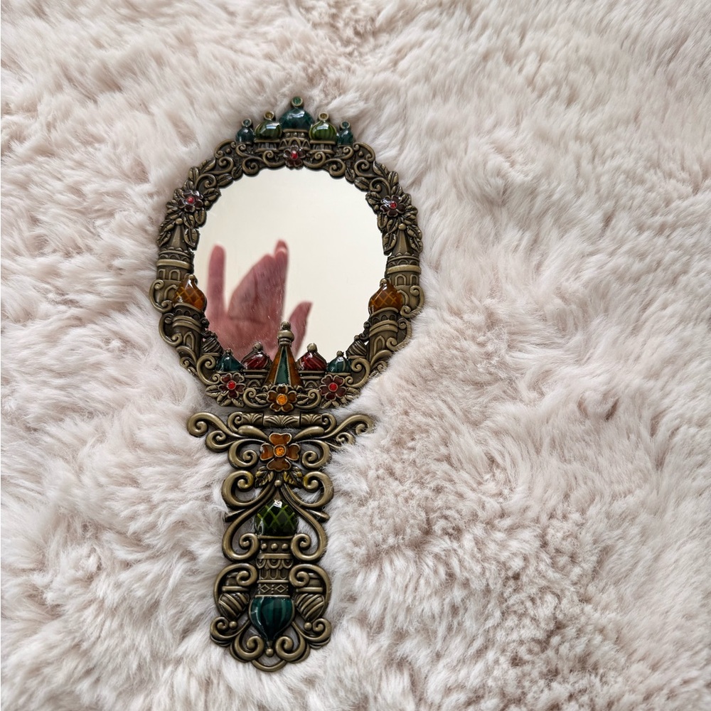 Ornate Handheld Mirror with Colorful Accents